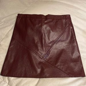 Deep maroon faux leather skort, barley worn!